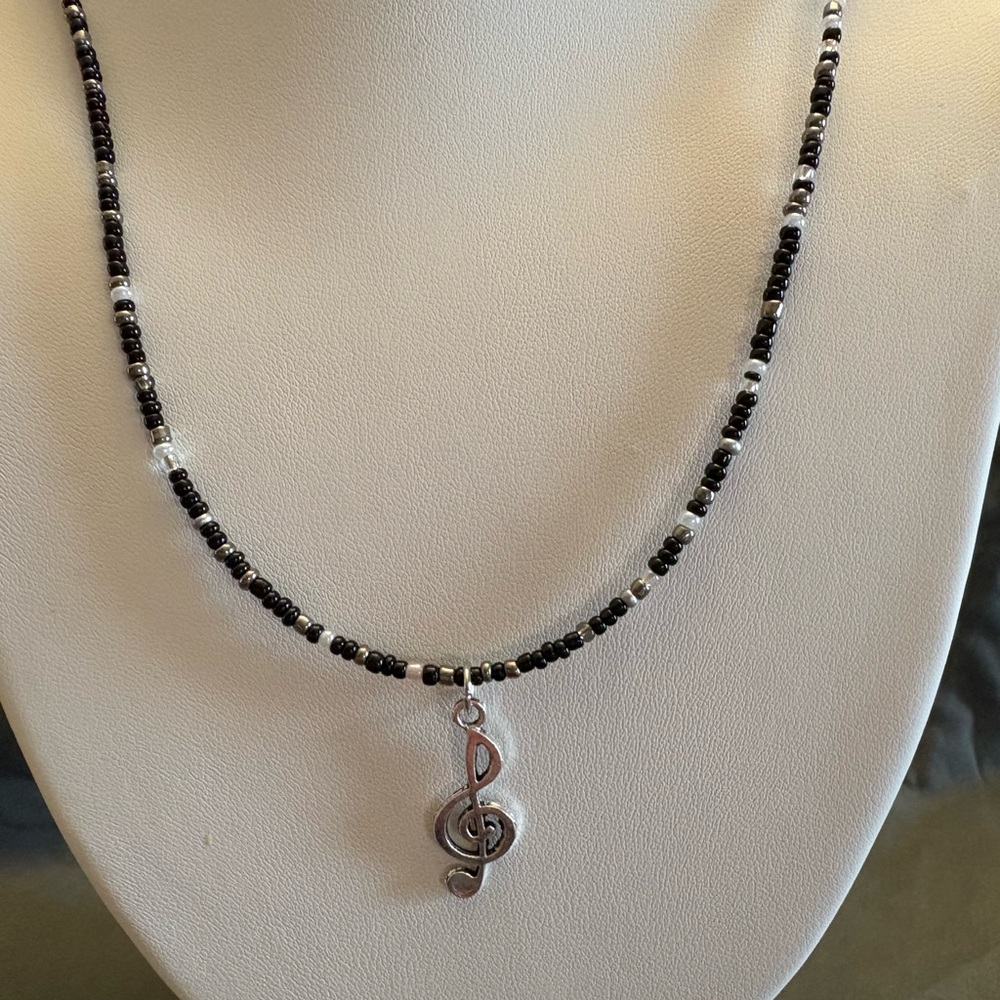 Hand beaded necklace with Treble clef charm
